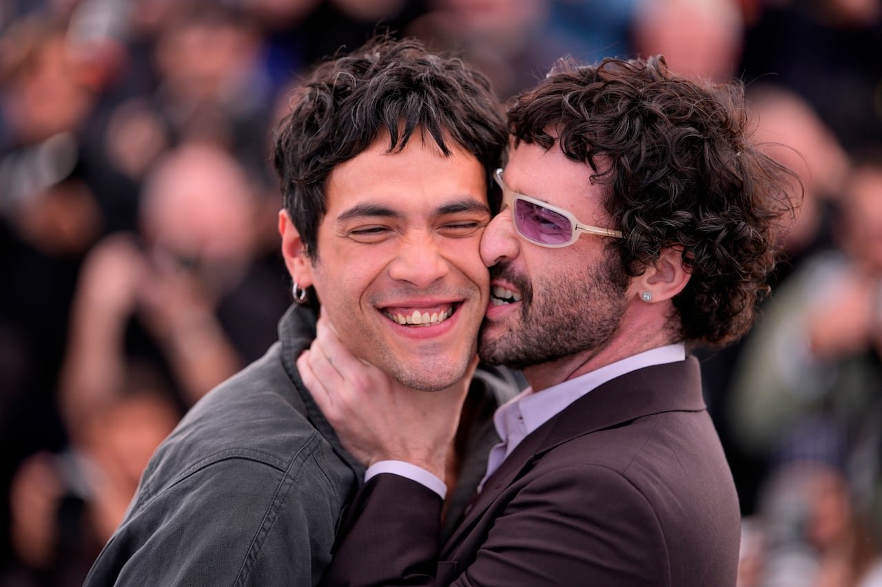 default-885 Director Jordan Firstman embraces Diego Calva on the red carpet at Cannes.